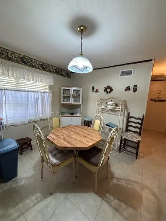 a living room with a couch and a window