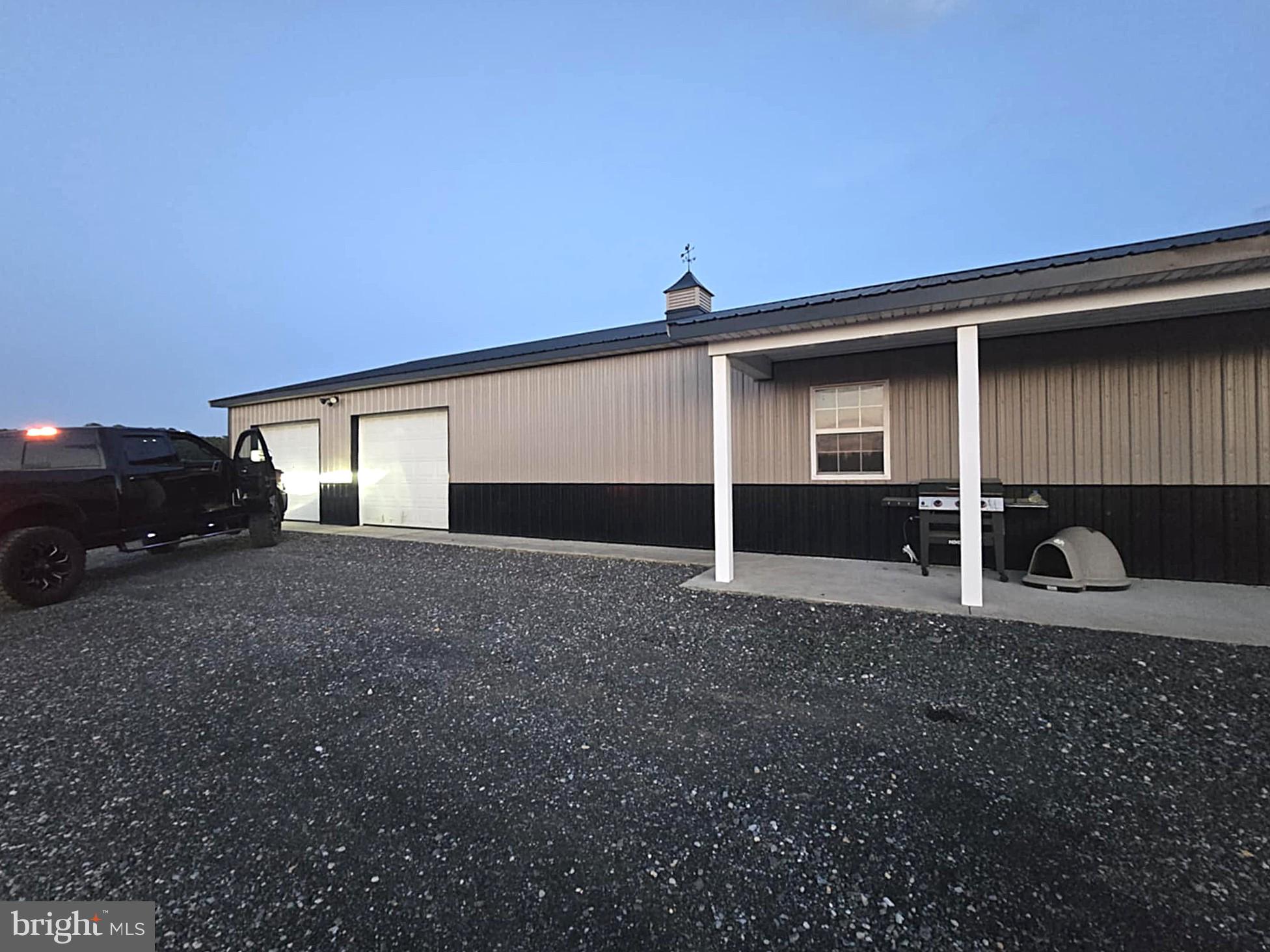 8019 Patten Road Denton, MD 21629 - Photo 9 of 11 a view of a house with a yard