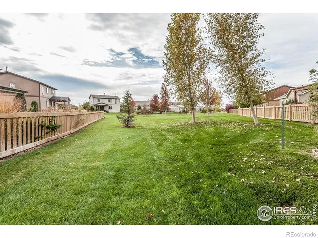 a view of a garden with an outdoor space