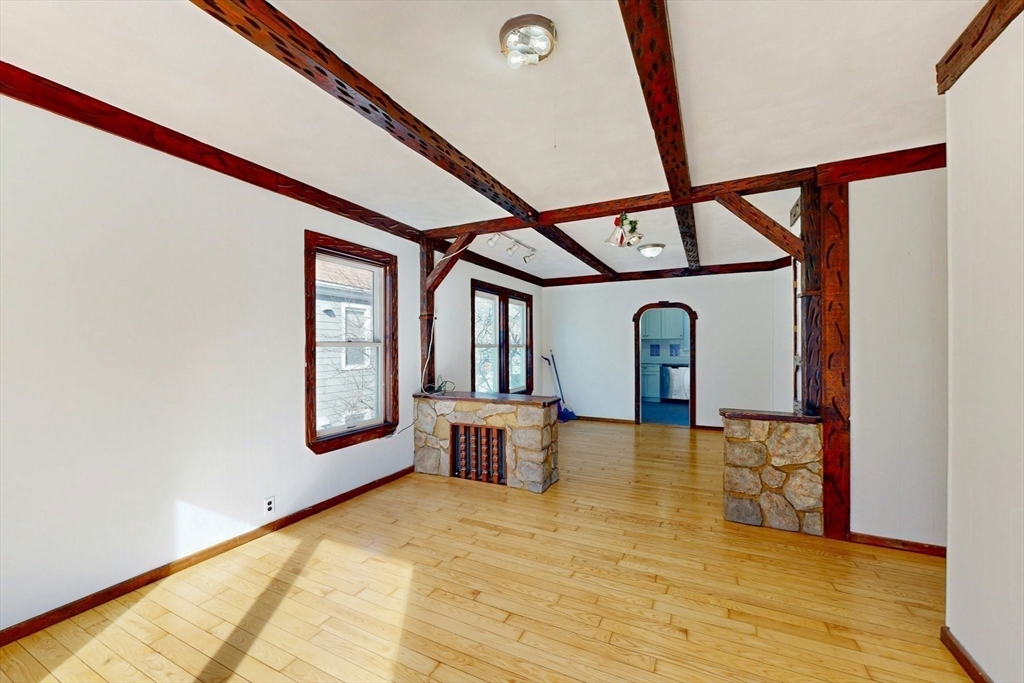5 Alcott Street Boston, MA 02134 - Photo 12 of 36 a view of livingroom with furniture and staircase