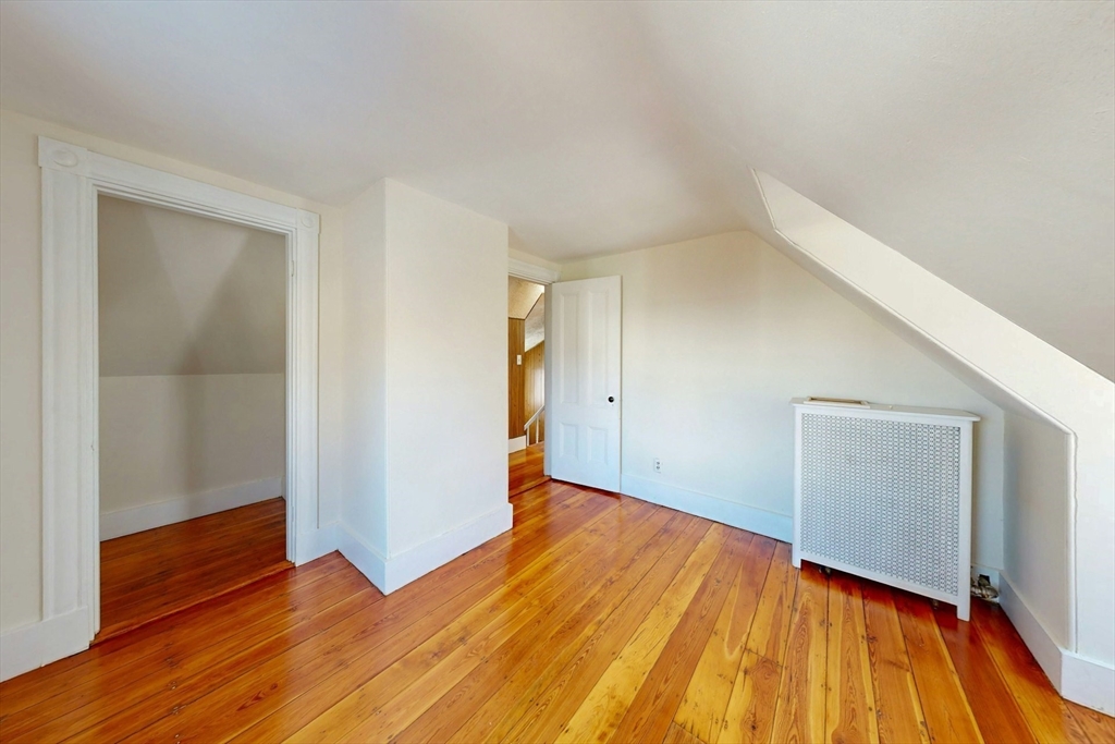 5 Alcott Street Boston, MA 02134 - Photo 24 of 36 a view of a room with wooden floor