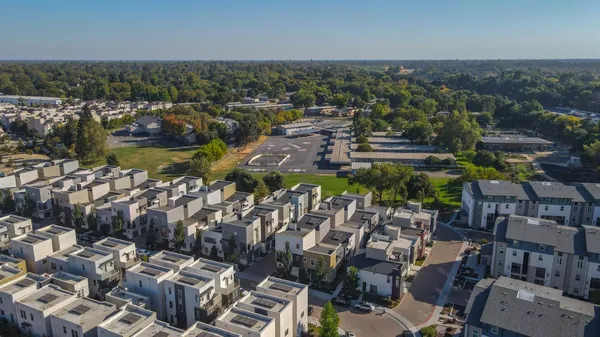 an aerial view of multiple house