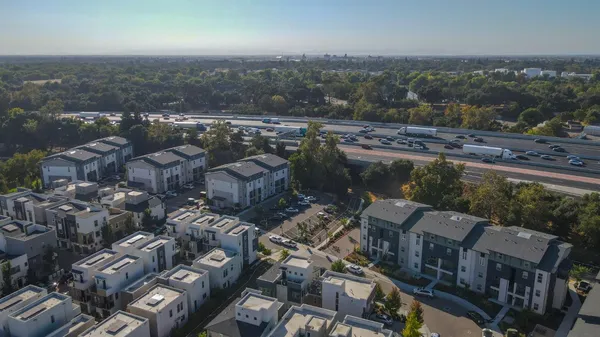 a view of city with tall buildings