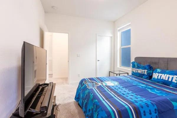 a bathroom with a toilet and a sink