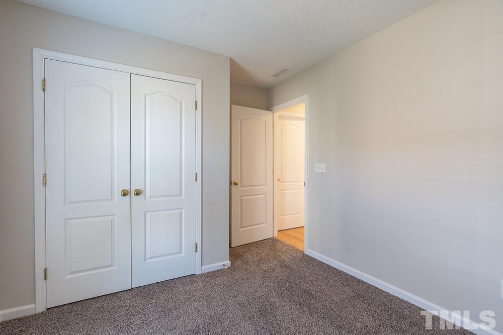 9904 Redhook Court Raleigh, NC 27617 - Photo 23 of 30 Bedroom 3