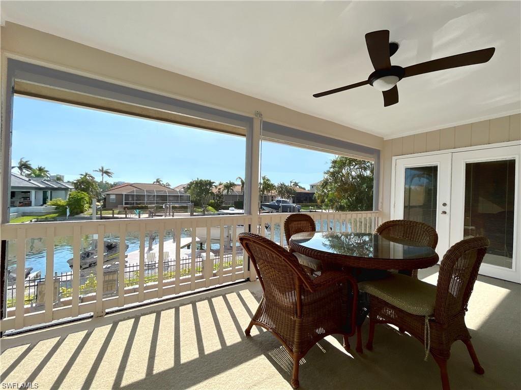 110 June Court Marco Island, FL 34145 - Photo 12 of 31 a view of a dining room with furniture window and outside view