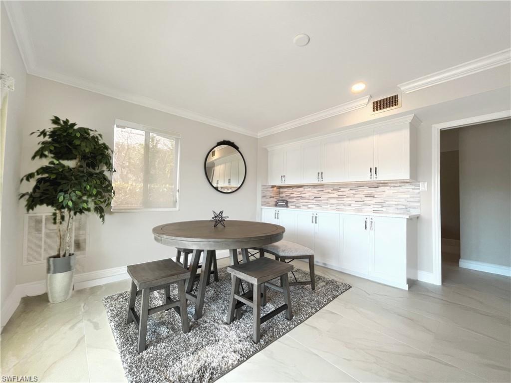 110 June Court Marco Island, FL 34145 - Photo 21 of 31 a view of a dining room and kitchen