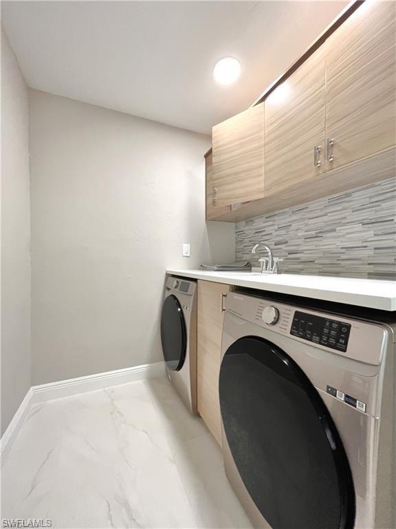 110 June Court Marco Island, FL 34145 - Photo 26 of 31 a utility room with dryer and washer