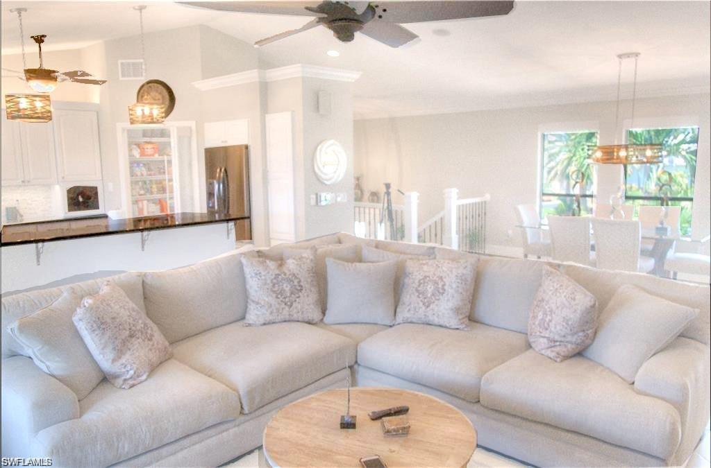 110 June Court Marco Island, FL 34145 - Photo 6 of 31 a living room with furniture and a large window