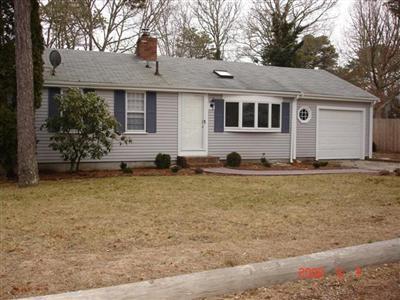 a front view of house with yard