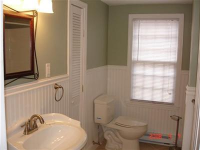 Undisclosed Address Harwich, MA 02645 - Photo 6 of 9 a bathroom with a sink toilet and shower
