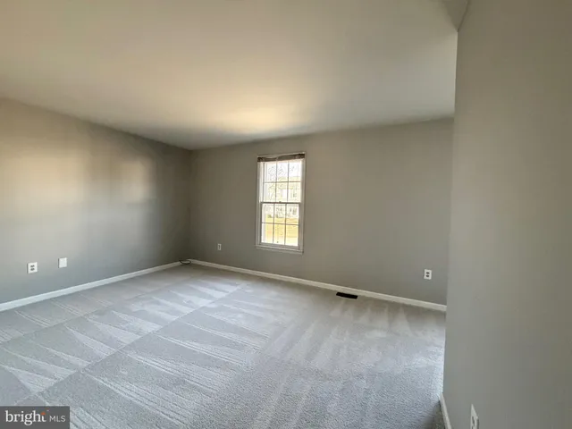 wooden floor and window in a room