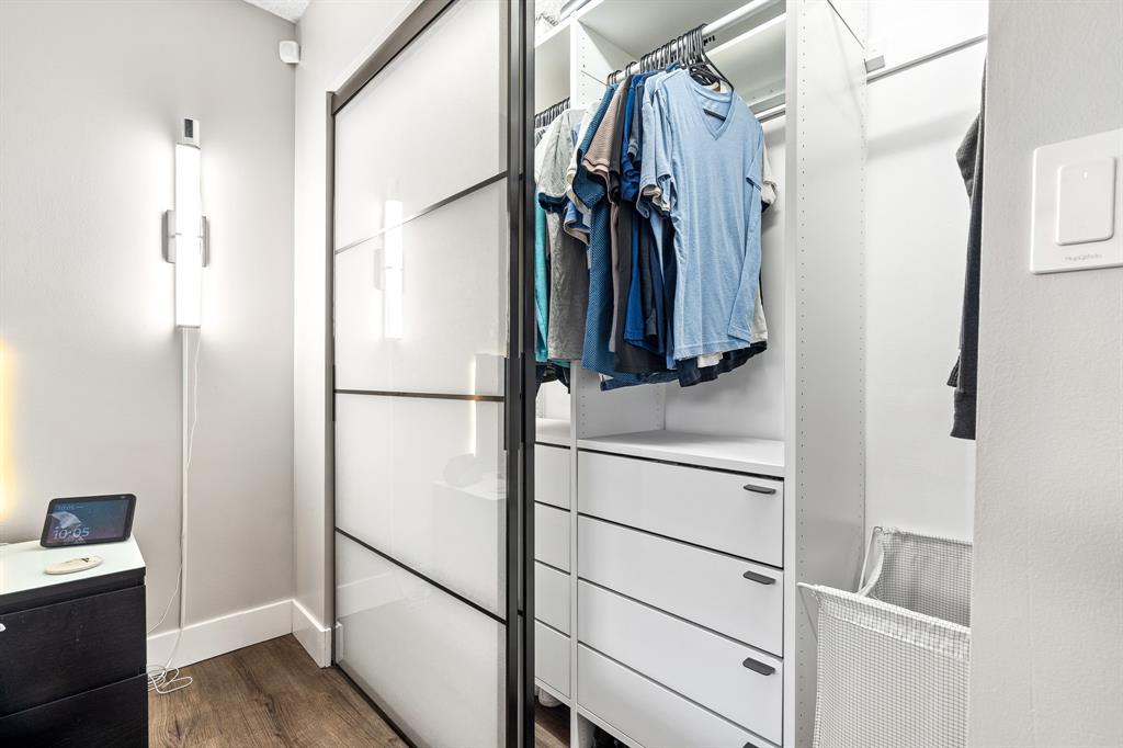 4620 West McNab Road, Unit B1 Pompano Beach, FL 33069 - Photo 25 of 36 a view of walk in closet with clothes and shoes