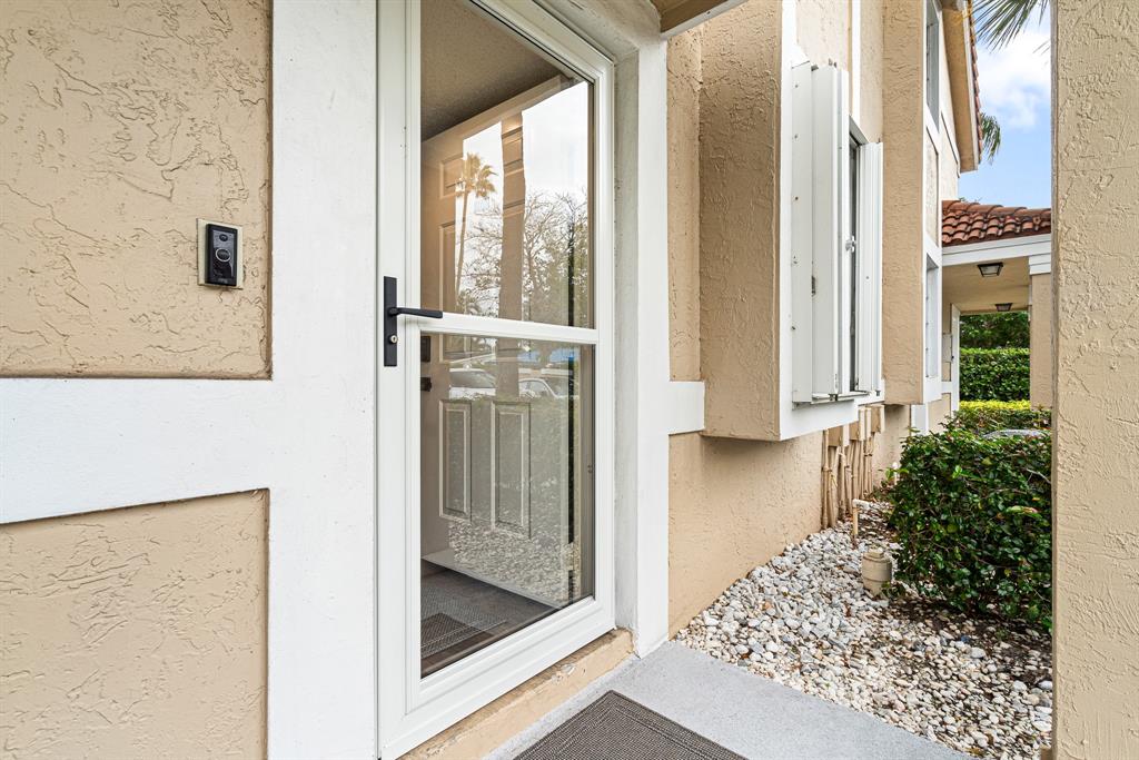 4620 West McNab Road, Unit B1 Pompano Beach, FL 33069 - Photo 28 of 36 a bathroom with a tub and shower