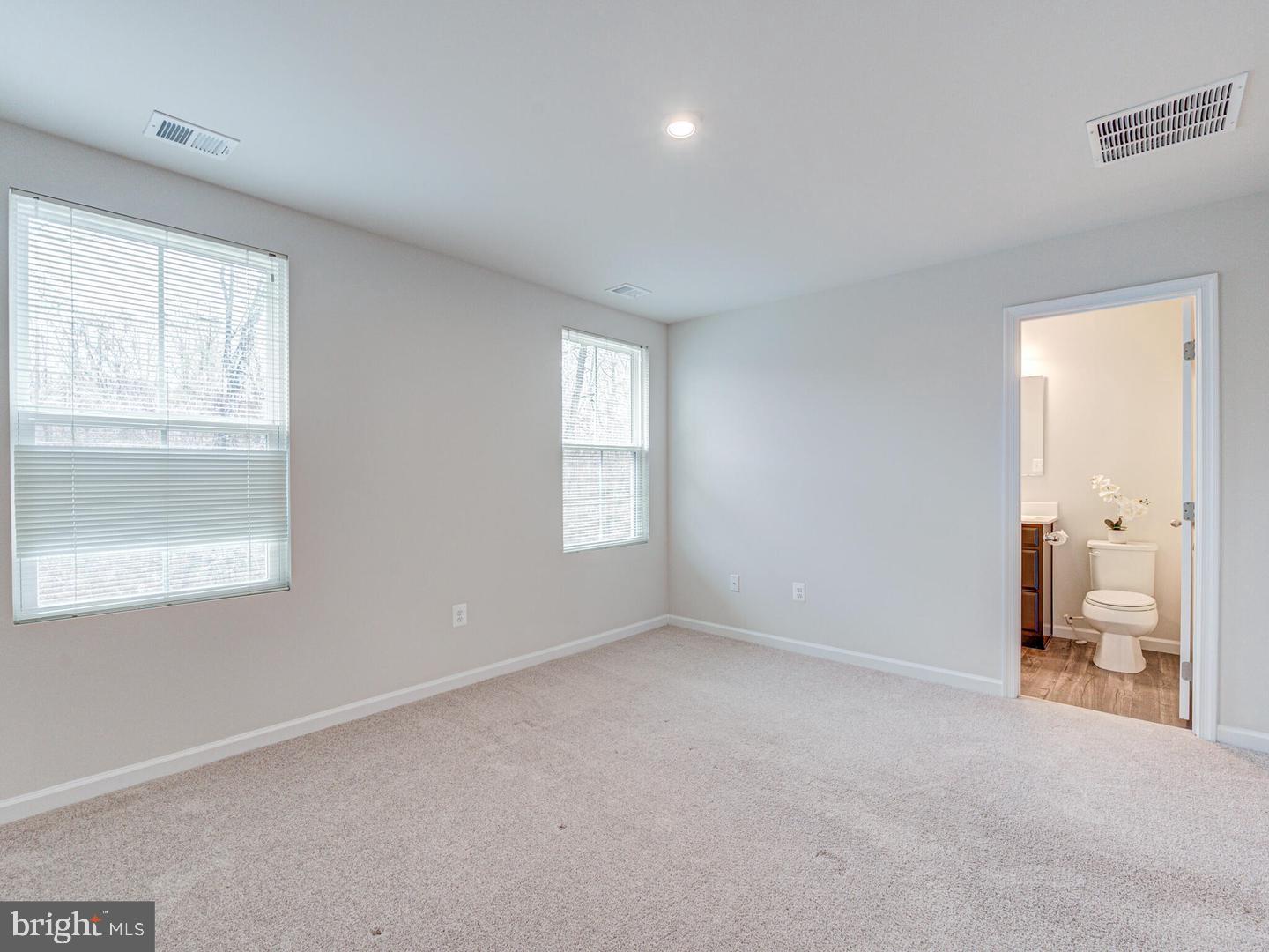 290 Sage Circle Winchester, VA 22603 - Photo 16 of 31 a view of an empty room with a window and bathroom
