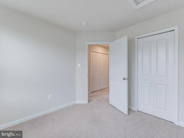 a bathroom with a sink a toilet and shower curtain
