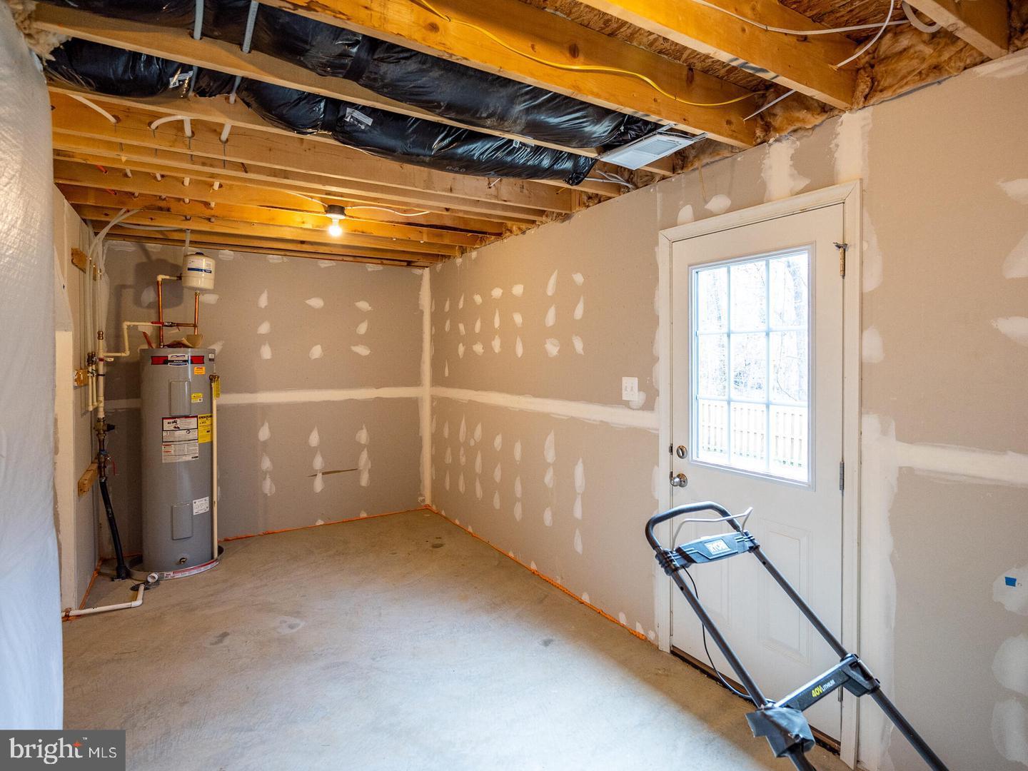 290 Sage Circle Winchester, VA 22603 - Photo 26 of 31 a view of empty room with wooden floor and windows