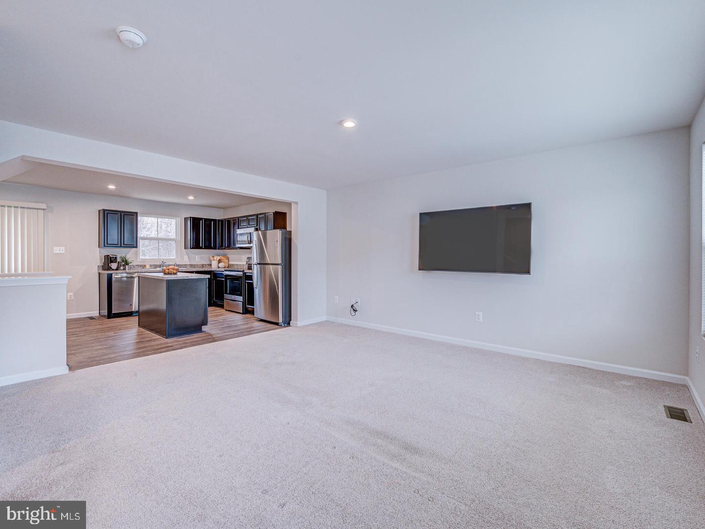 290 Sage Circle Winchester, VA 22603 - Photo 10 of 31 a view of a kitchen with a sink cabinets and a kitchen