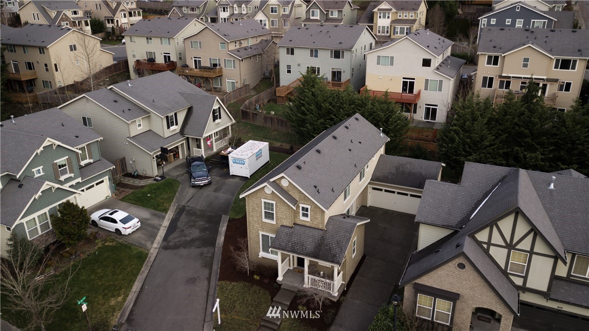 662 Lyons Avenue Northeast Renton, WA 98059 - Photo 3 of 28 an aerial view of residential houses with outdoor space