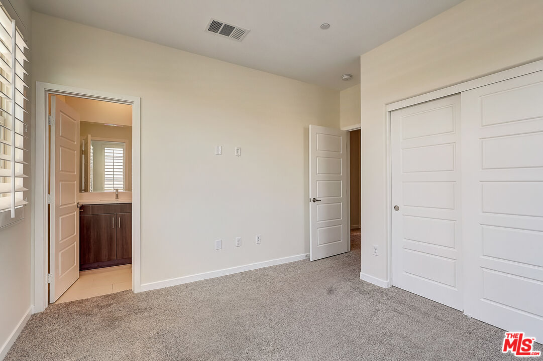 202 Paramount Irvine, CA 92618 - Photo 26 of 32 an empty room with closet area