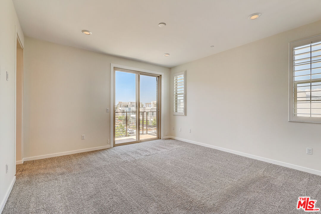 202 Paramount Irvine, CA 92618 - Photo 27 of 32 a view of an empty room with a window