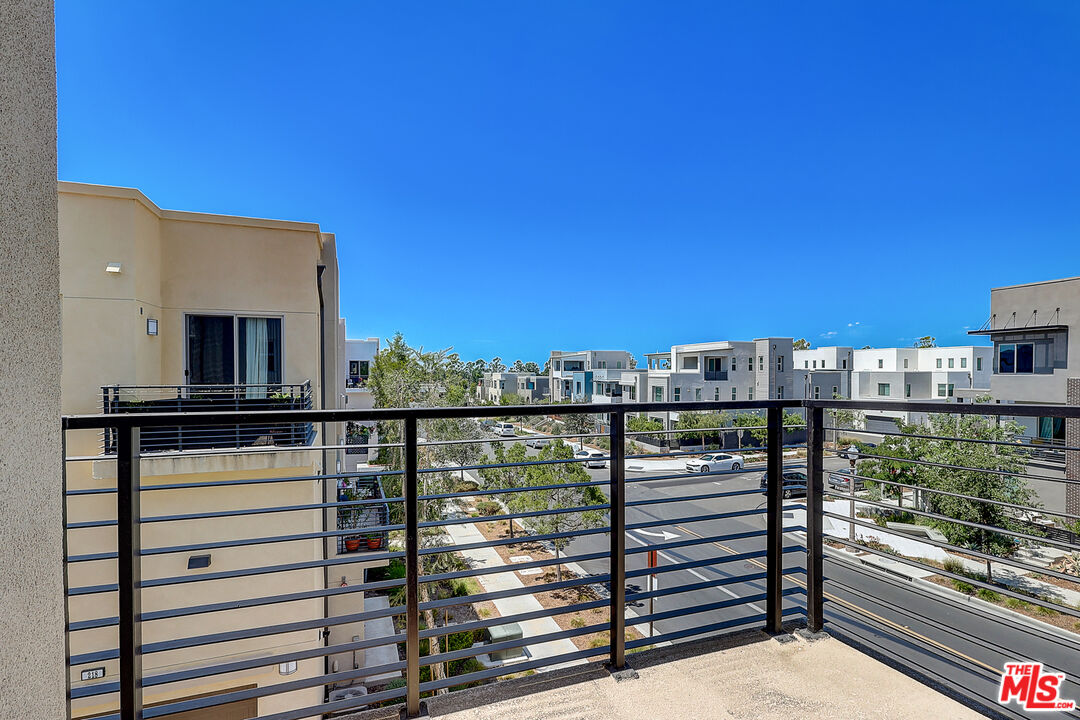 202 Paramount Irvine, CA 92618 - Photo 30 of 32 a view of a balcony with city view