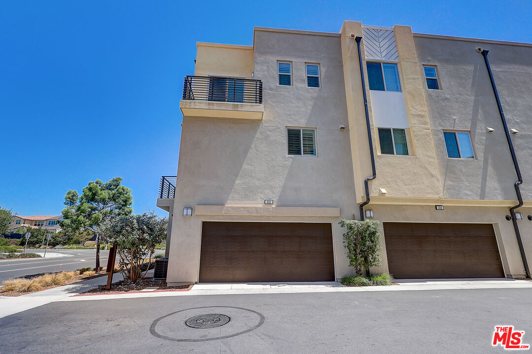 202 Paramount Irvine, CA 92618 - Photo 7 of 32 an aerial view of a house with a yard