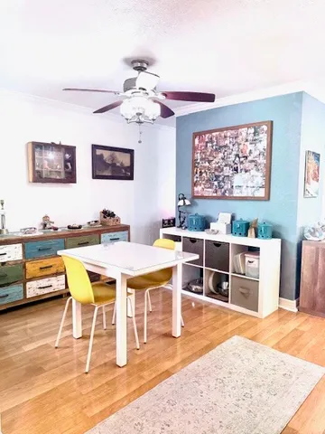 a view of a dining room with furniture