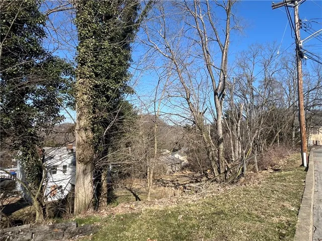 a view of a yard next to a building