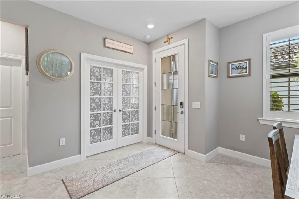 5825 Mayflower Way Ave Maria, FL 34142 - Photo 23 of 50 a view of an empty room with a window