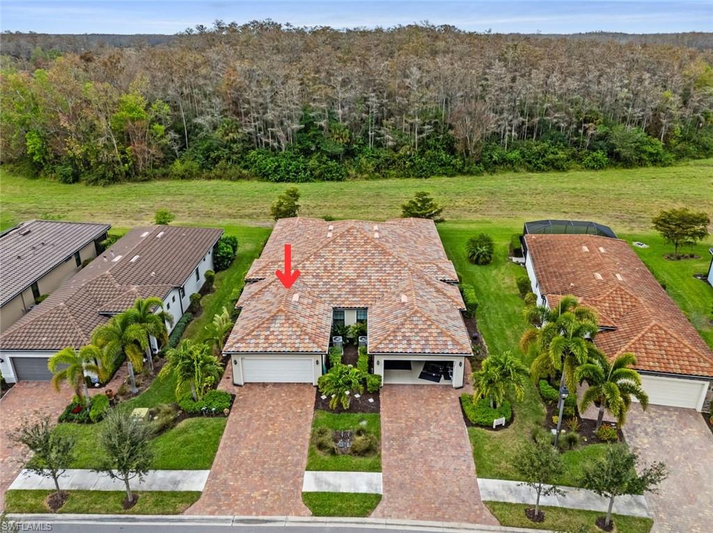 5825 Mayflower Way Ave Maria, FL 34142 - Photo 35 of 50 an aerial view of a house with big yard