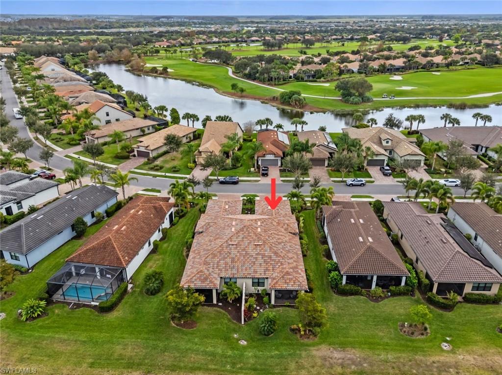 5825 Mayflower Way Ave Maria, FL 34142 - Photo 39 of 50 an aerial view of residential houses with outdoor space