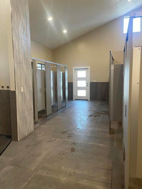 74711 Dillon Road, Unit 711 Desert Hot Springs, CA 92241 - Photo 26 of 35 a view of a hallway with wooden shelves