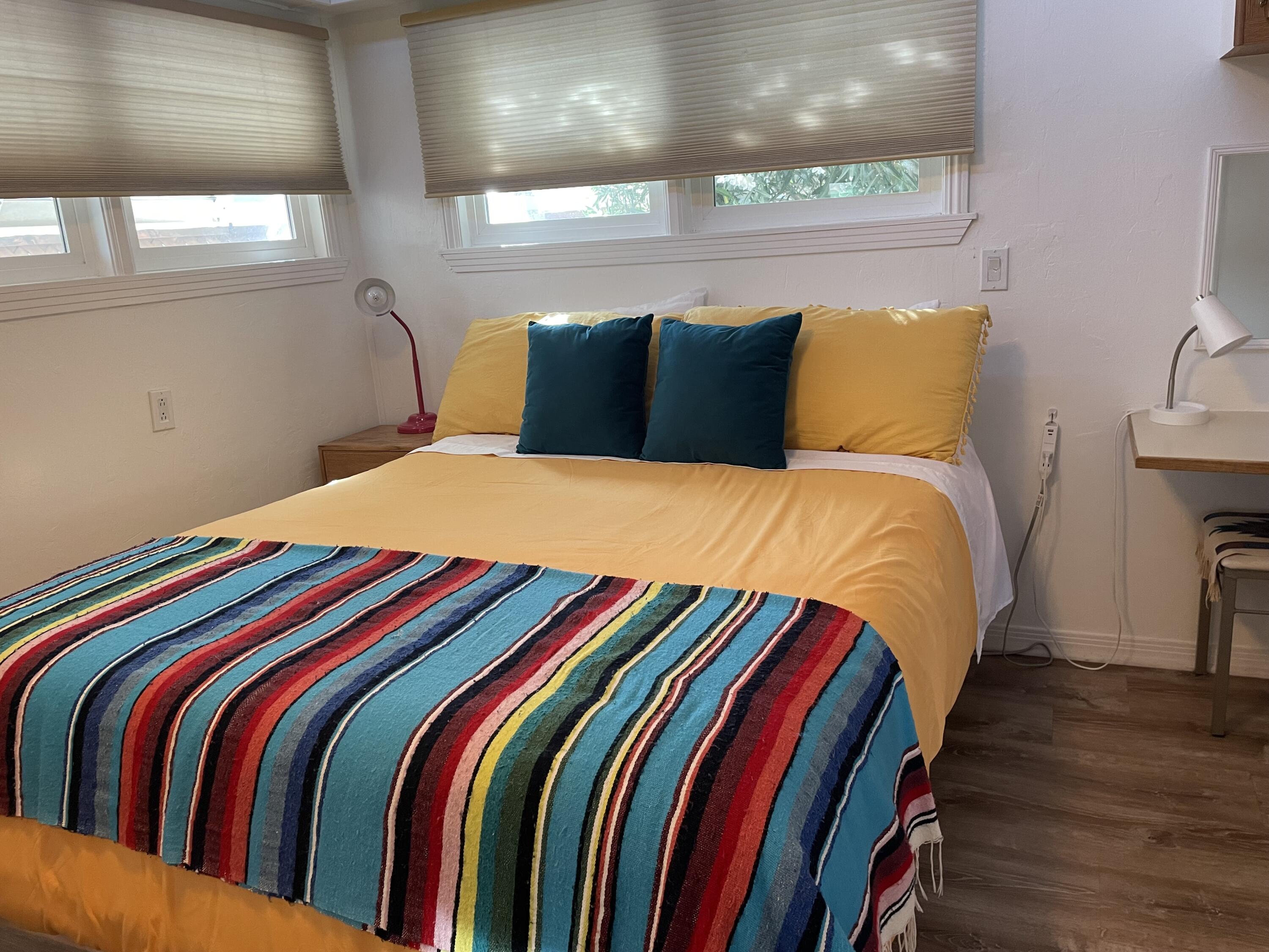 74711 Dillon Road, Unit 711 Desert Hot Springs, CA 92241 - Photo 7 of 35 a bedroom with a bed and a window