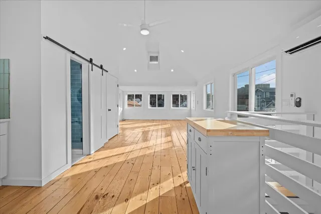 a spacious bathroom with a tub and shower