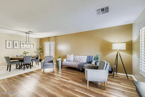 a living room with furniture and a window