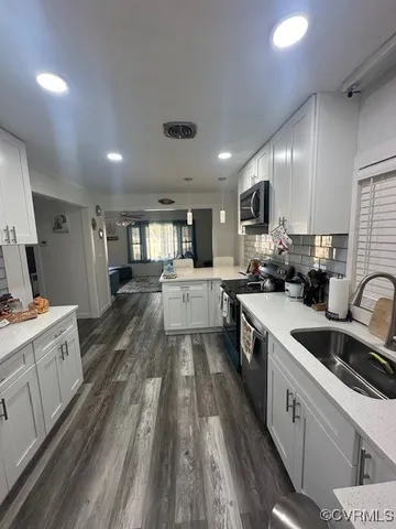a large kitchen with a lot of counter space
