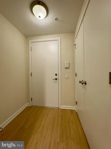 a kitchen with stainless steel appliances granite countertop a refrigerator a stove and a sink