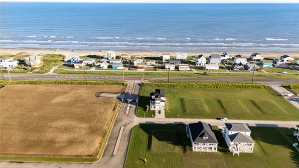 a view of a swimming pool and an outdoor seating
