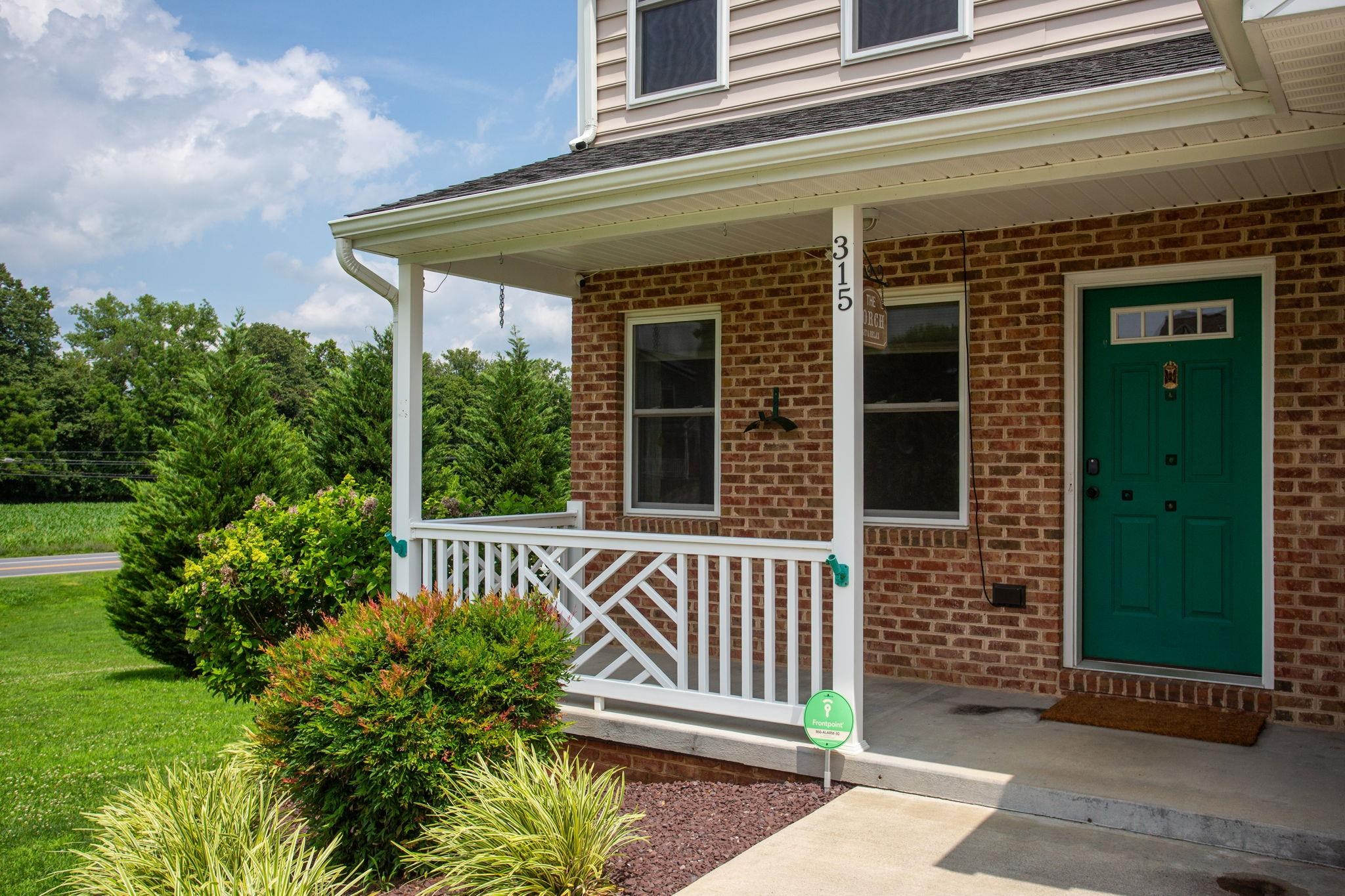 315 Rustic Avenue Broadway, VA 22815 - Photo 2 of 19 Mature landscaping including beautiful flowering trees.