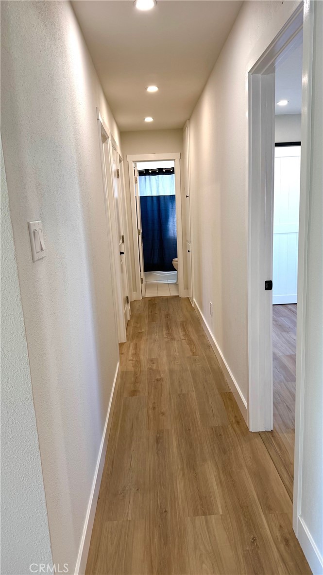 2304 Workman Avenue Simi Valley, CA 93063 - Photo 4 of 6 a view of a hallway with wooden floor