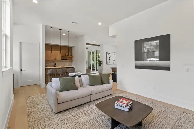 a living room with furniture and a rug