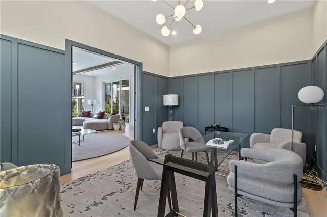 a view of a livingroom with furniture and a dining room