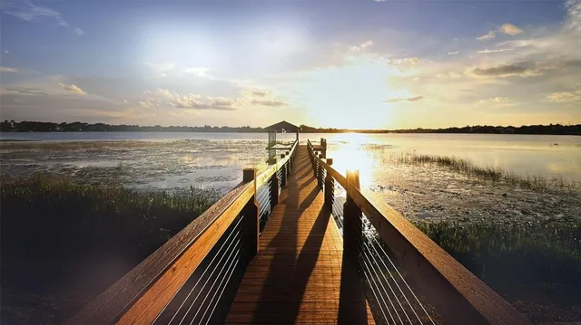 a view of a lake from a balcony