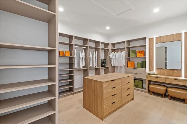 a kitchen with a refrigerator and a sink