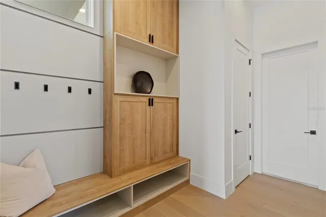 a view of entryway with wooden floor