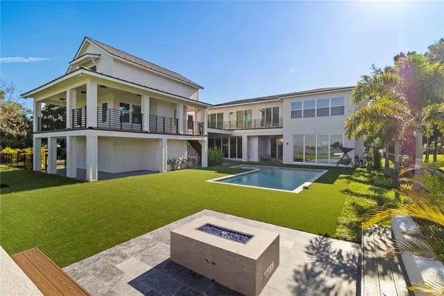 a view of a house with a swimming pool