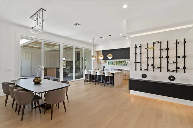a living room with furniture and white walls