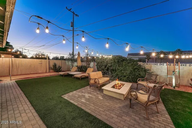 a view of a yard with patio