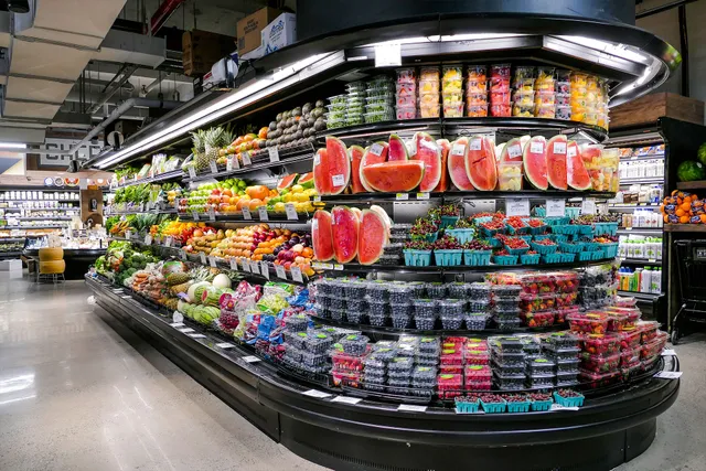 a room filled with lots of fruit and vegetables